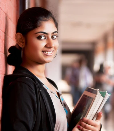 Girl holding books
